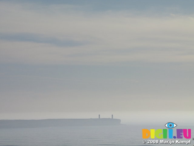 SX01847 Towers on Brownstown head in mist